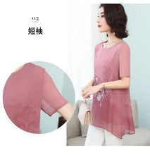 Load image into Gallery viewer, Summer Floral Printed Chiffon Shirt Short Sleeve Female Clothing Loose Stylish Asymmetrical Commute O-Neck Spliced Midi Blouse